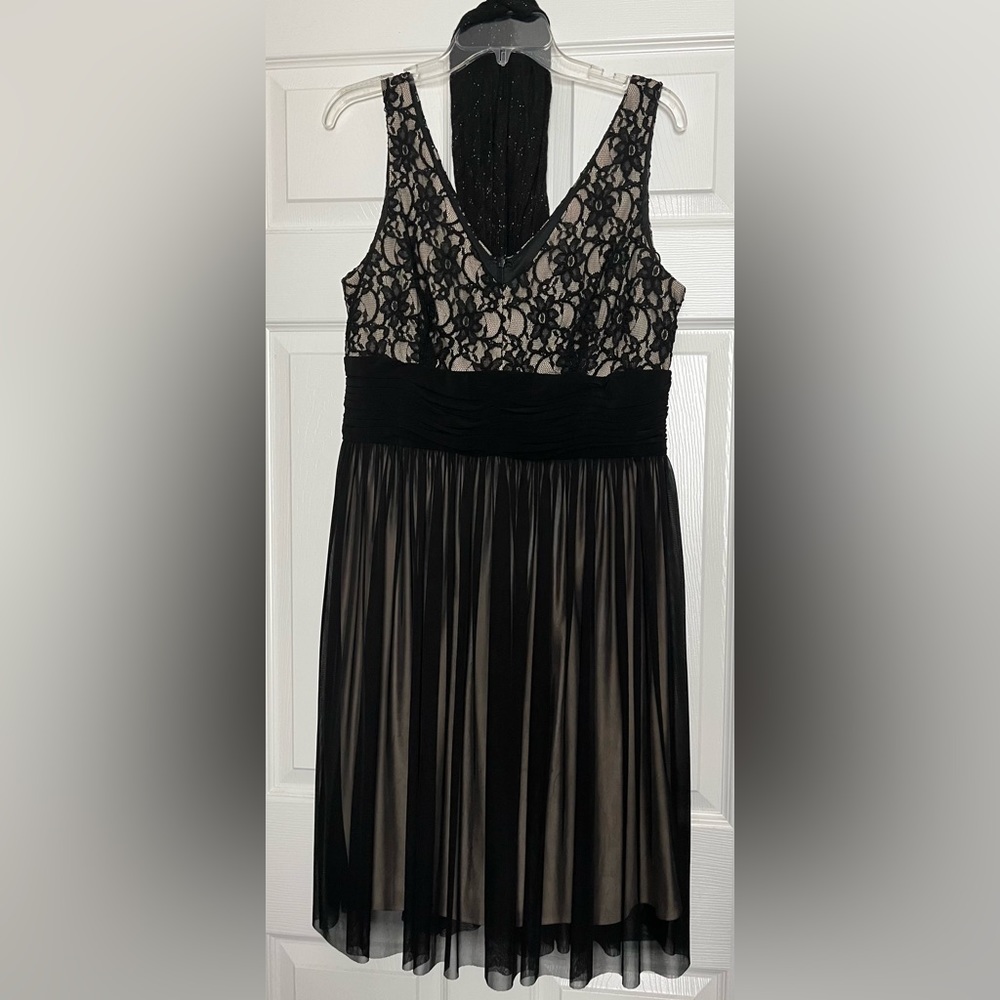 Adorable black cocktail dress w/sheer underlay